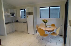 Standard Suite, 2 Bedrooms, Kitchen (Waterview Villa) | Private kitchen - Del Rio Riverside Resort (Webbs Creek)