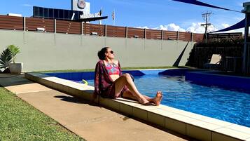 Outdoor pool, open 8:00 AM to 9:00 PM, pool umbrellas, sun loungers