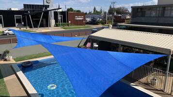 Family Apartment, 2 Bedrooms, Kitchen, Pool View | Individually decorated, desk, laptop workspace, blackout drapes