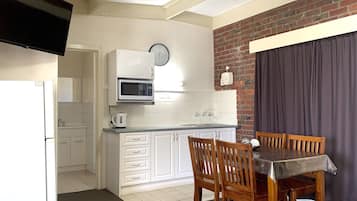 Family Apartment, 2 Bedrooms, Kitchen, Pool View | Individually decorated, desk, laptop workspace, blackout drapes