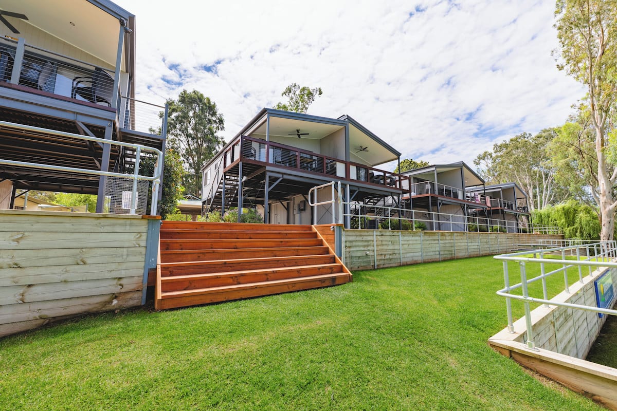 Deluxe Elevated Riverfront Cabin | Terrace/patio
