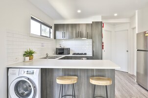 Deluxe Elevated Riverfront Cabin | Private kitchen | Fridge, microwave, oven, stovetop