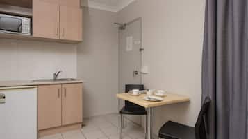 Premium bedding, blackout curtains, soundproofing, iron/ironing board