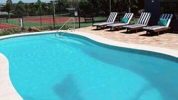 Outdoor pool, open 8:00 AM to 8:00 PM, pool umbrellas, pool loungers