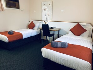 Standard Room, Non Smoking (Twin Room) | Desk, iron/ironing board, free WiFi, bed sheets