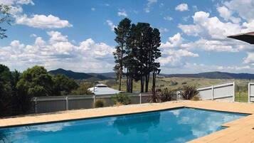 Outdoor pool, pool umbrellas, pool loungers
