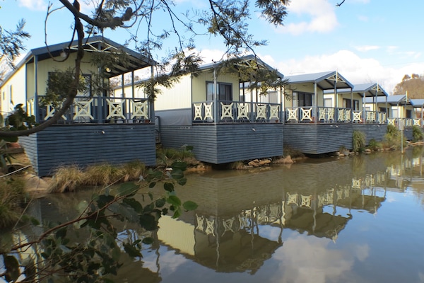 Standard Suite, 2 Bedrooms, Balcony, Lake View (Lake Villa) | Iron/ironing board, bed sheets