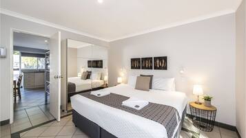 Blackout curtains, iron/ironing board, bed sheets