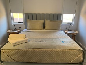 Suite Exécutive, 1 très grand lit | Coin séjour