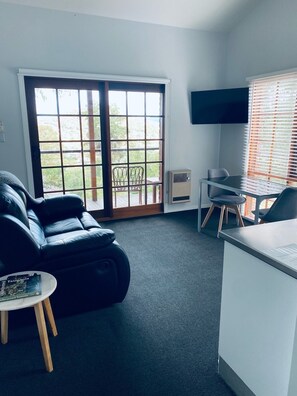 Studio Two | Living area | 40-inch LCD TV with digital channels, TV, Netflix