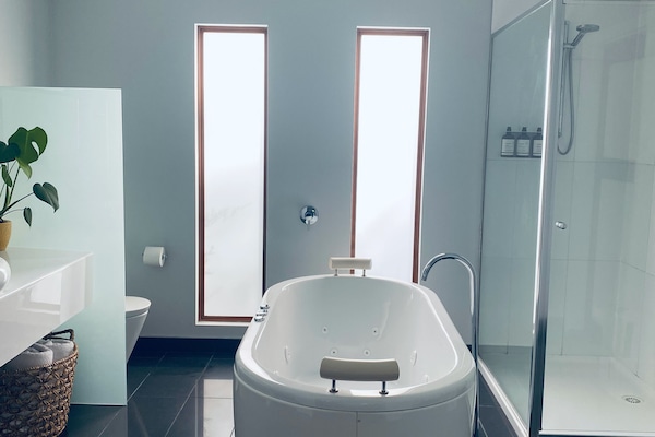 Studio One | Bathroom | Hair dryer, towels, soap, shampoo