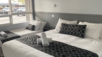 King + Single Bed + Kitchenette | Individually decorated, iron/ironing board, free WiFi, bed sheets