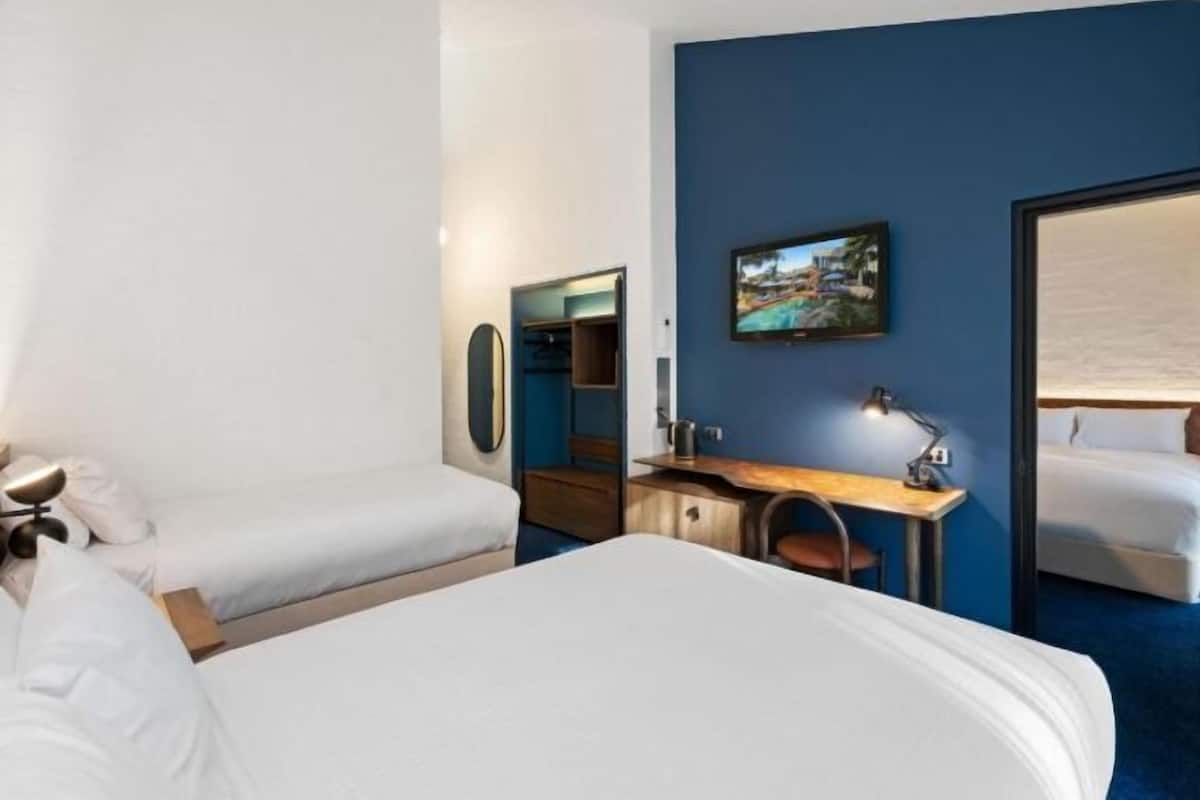 2 bedrooms, desk, blackout curtains, iron/ironing board