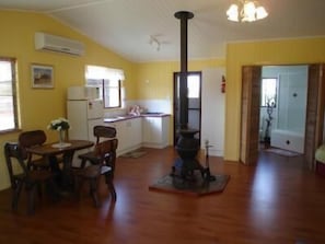 Luxury Suite, 2 Bedrooms, Kitchen (Luxury Cottage) | Living room | Flat-screen TV, fireplace, DVD player