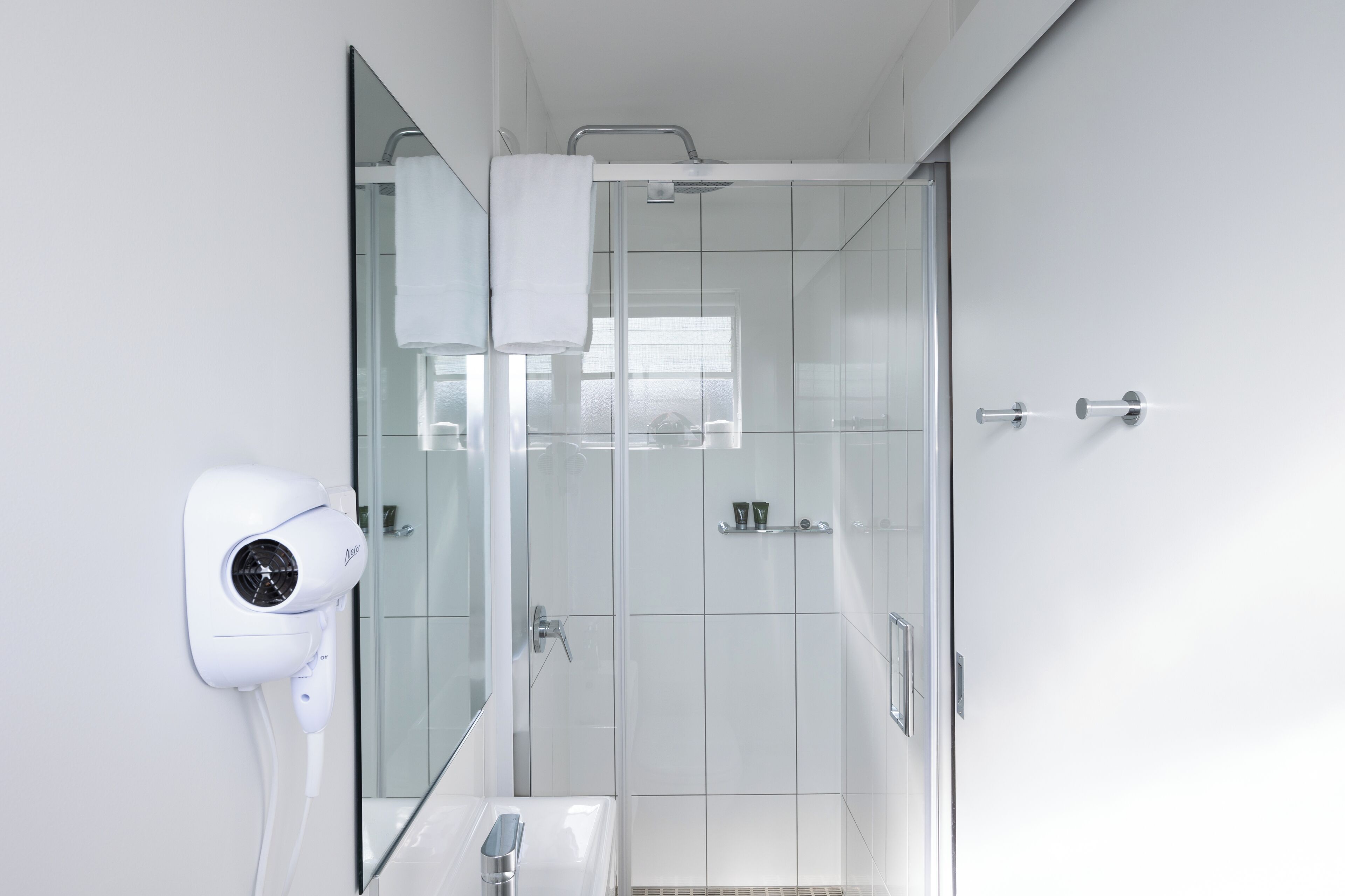 Shower, free toiletries, hair dryer, towels