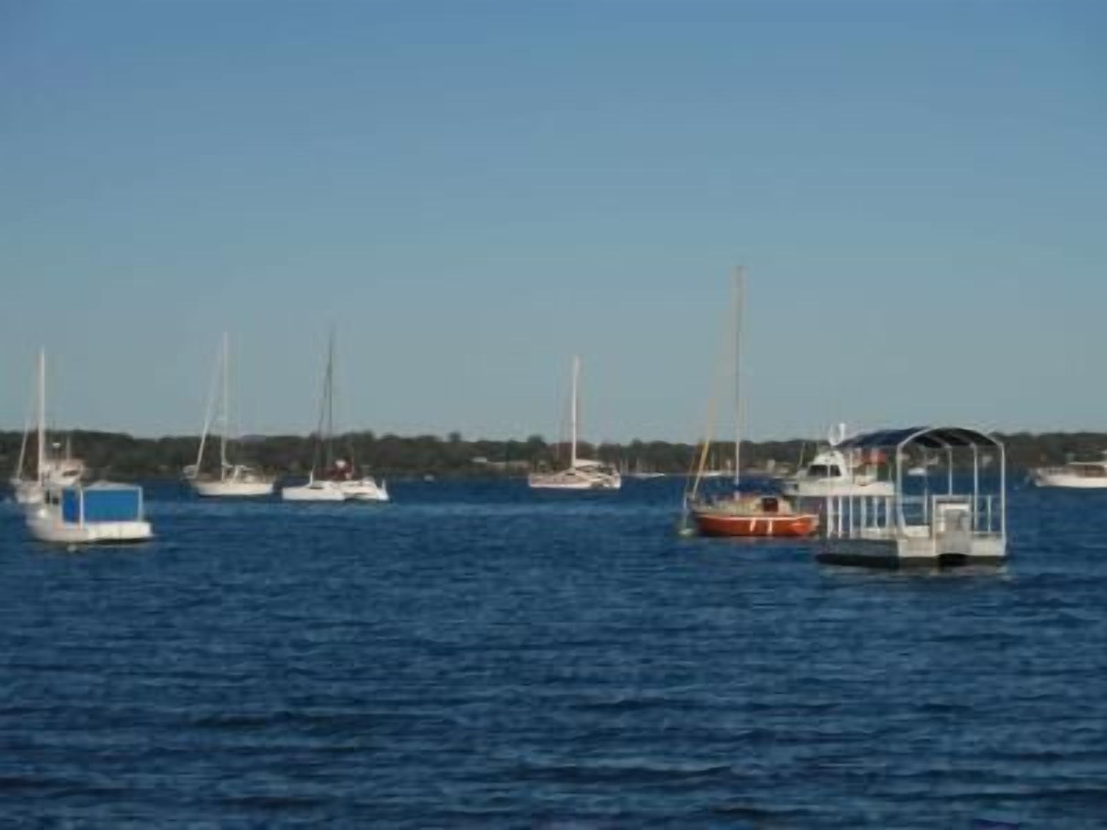 A marina with several boats docked.