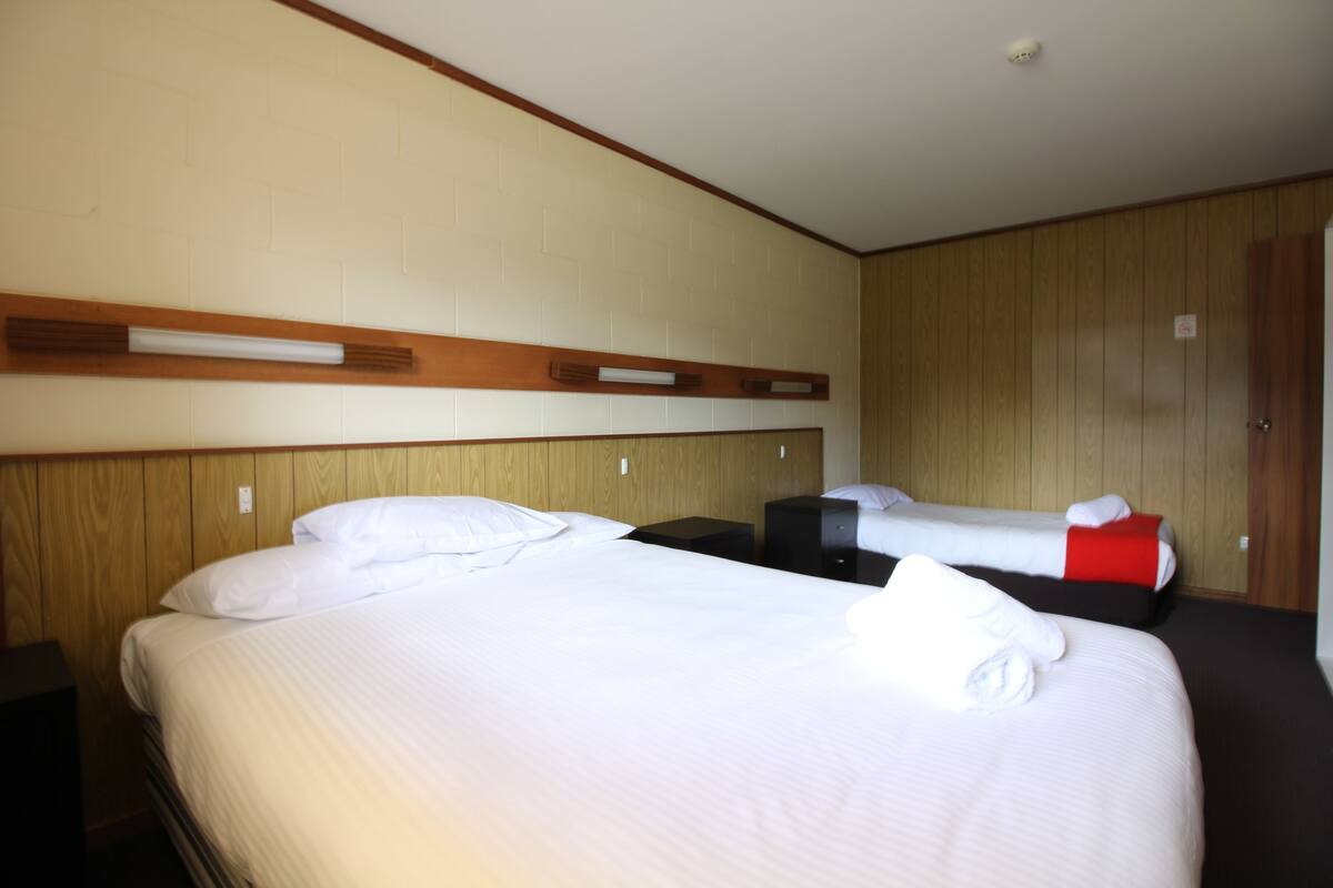 2 Bedroom Unit (1 Queen, 3 Singles, 1 Bunk Bed) | Premium bedding, memory foam beds, iron/ironing board (on request)
