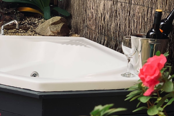 The Grange Jacuzzi Suite | 1 bedroom, minibar, iron/ironing board, bed sheets