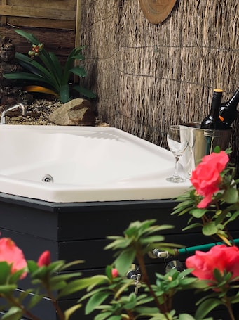 The Grange Jacuzzi Suite | 1 bedroom, minibar, iron/ironing board, bed sheets