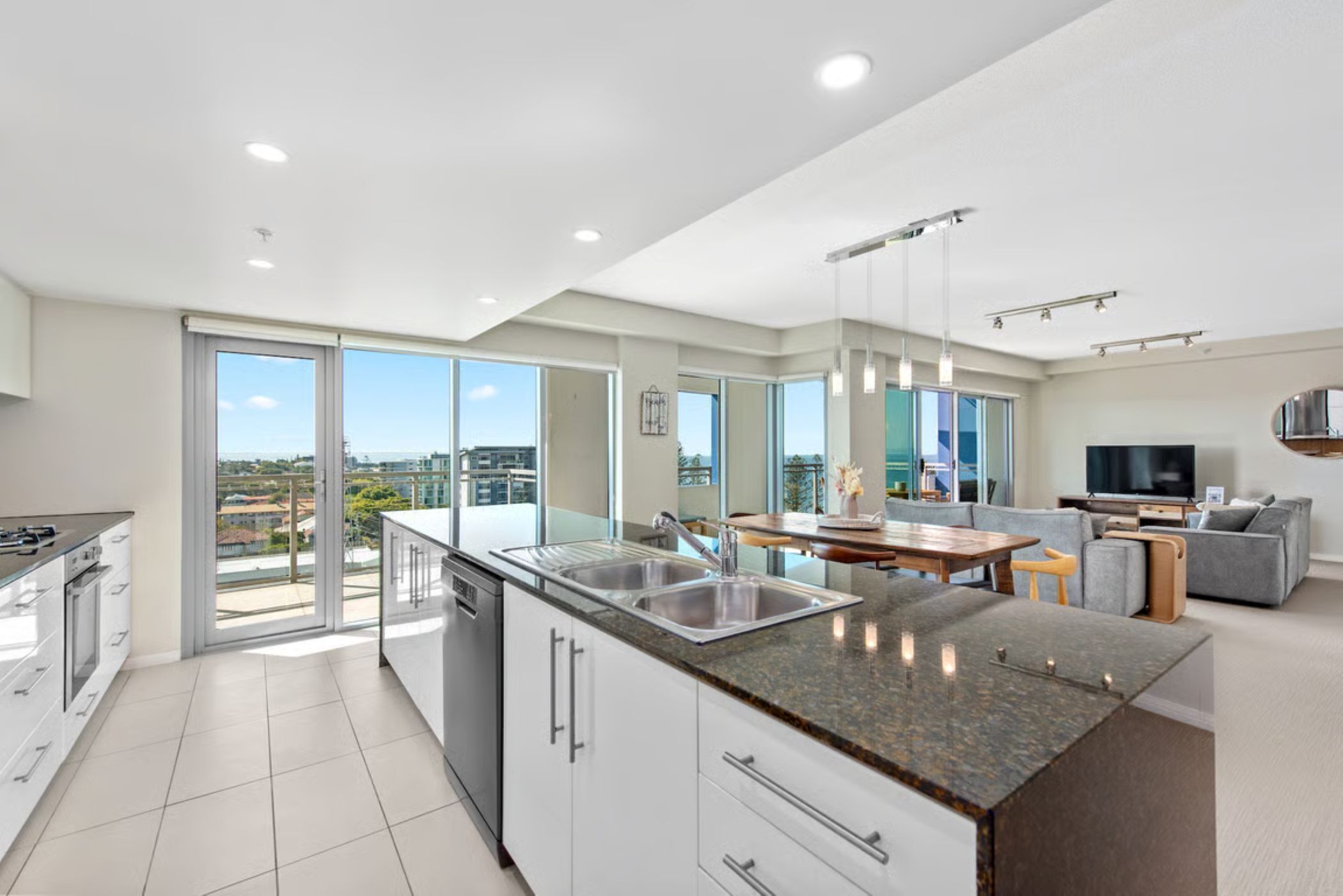 Two Bedroom Skyview Apartment | Living area | 55-inch TV with cable channels