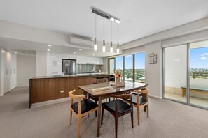 Two Bedroom Skyview Apartment | Living area | 55-inch TV with cable channels