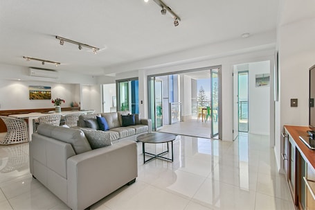 Three Bedroom + One Study Deluxe Ocean View | Living area. Proximity Waterfront Apartments