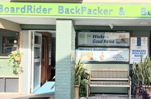 A storefront with a sign reading "BoardRider Backpacker & By." - Boardrider Backpacker & Budget Motel (Manly)