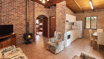 Rammed Earth Chalet | Living area | Flat-screen TV, fireplace, DVD player