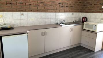 Fridge, microwave, coffee/tea maker, electric kettle