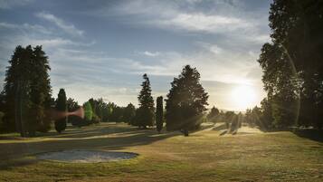 Surrounded by a serene landscape, this tranquil setting offers a peaceful escape.