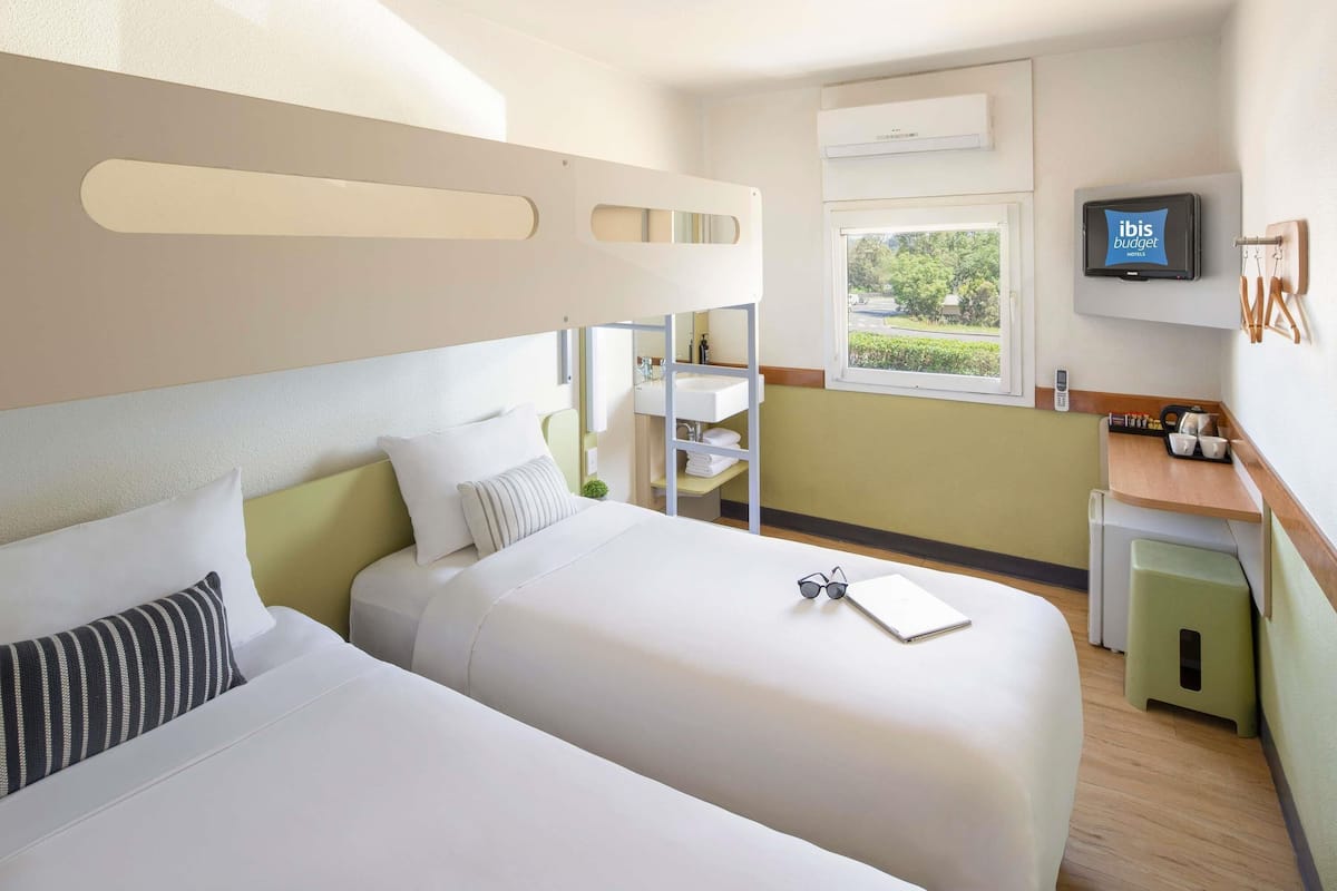 Standard Room, Multiple Beds | Premium bedding, desk, iron/ironing board, free WiFi