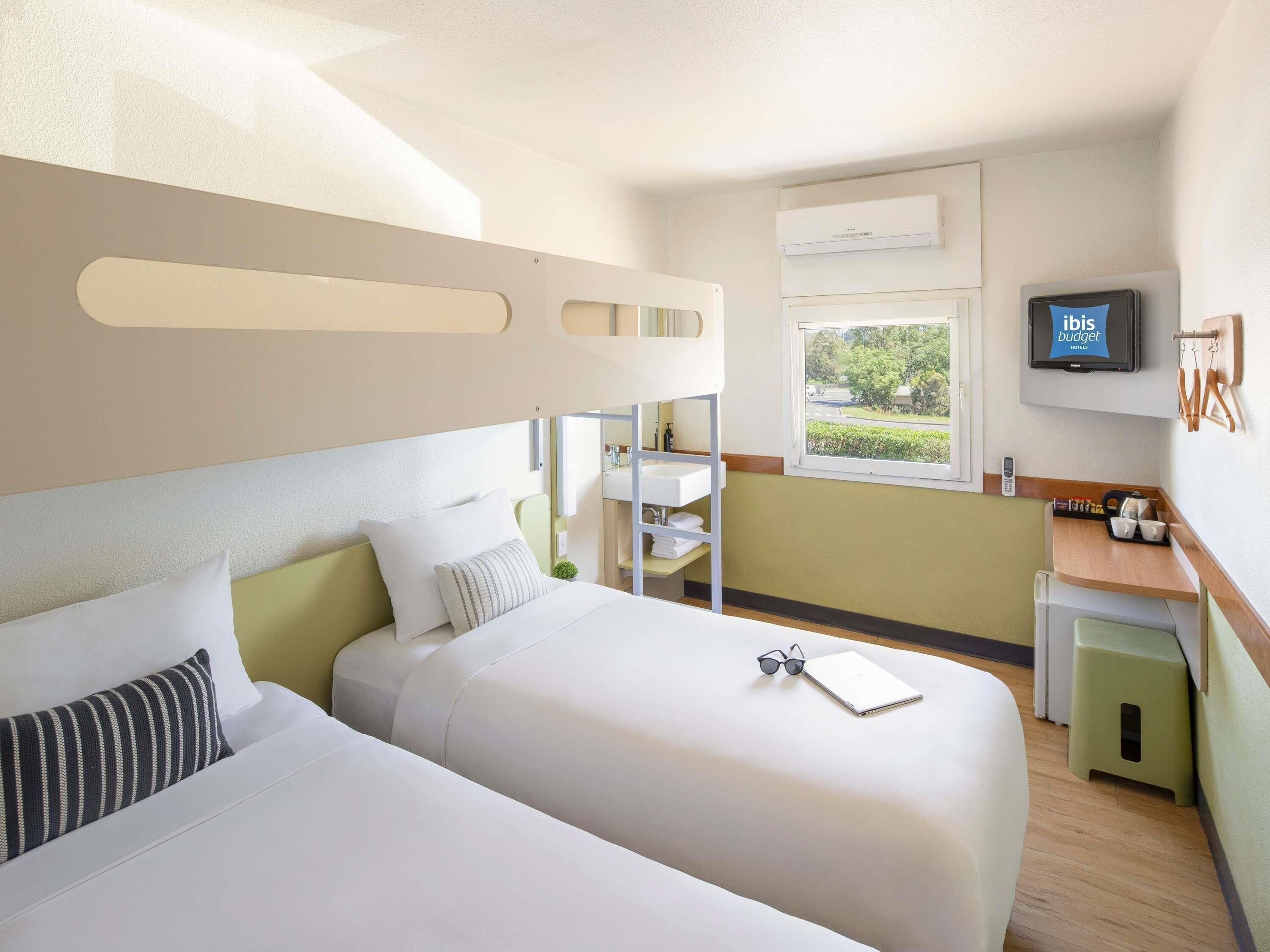 Standard Room, Multiple Beds | Premium bedding, desk, iron/ironing board, free WiFi