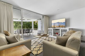 1 Bedroom Garden View Level 1 | Living area | 42-inch flat-screen TV with cable channels, TV, DVD player - Sundancer Holiday Apartments (Sunshine Beach)
