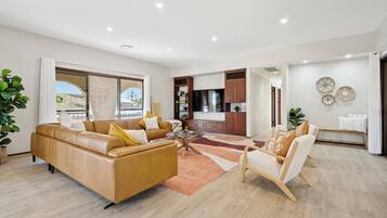 Comfort Apartment, 3 Bedrooms, Partial Ocean View | Living area | Flat-screen TV, DVD player