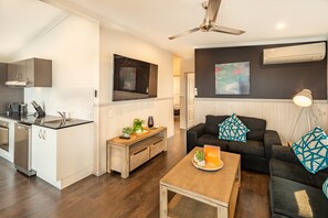 Waterfront Superior Cabin | Living room | Flat-screen TV, DVD player - Ingenia Holidays Nambucca Heads (Nambucca Heads)