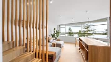 Deluxe Penthouse, Ocean View | Living area | Flat-screen TV, Netflix, streaming services