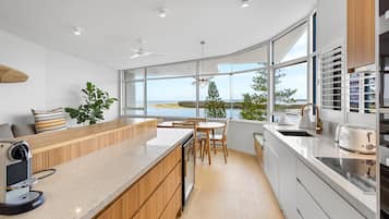 Deluxe Penthouse, Ocean View | Private kitchen | Full-sized fridge, microwave, oven, stovetop