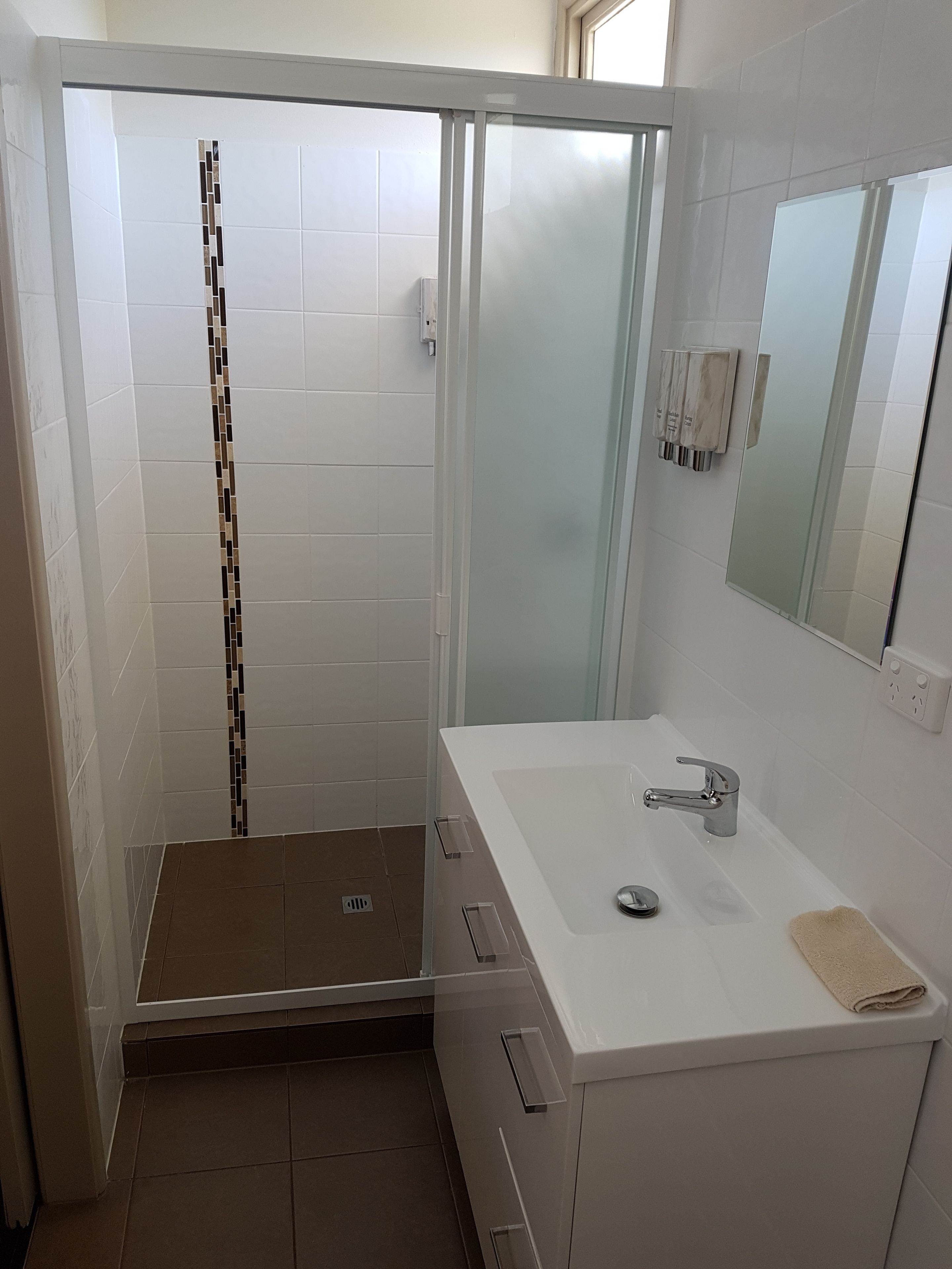 Shower, free toiletries, hair dryer, towels