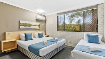 Economy Triple Room | Egyptian cotton sheets, premium bedding, iron/ironing board, travel crib