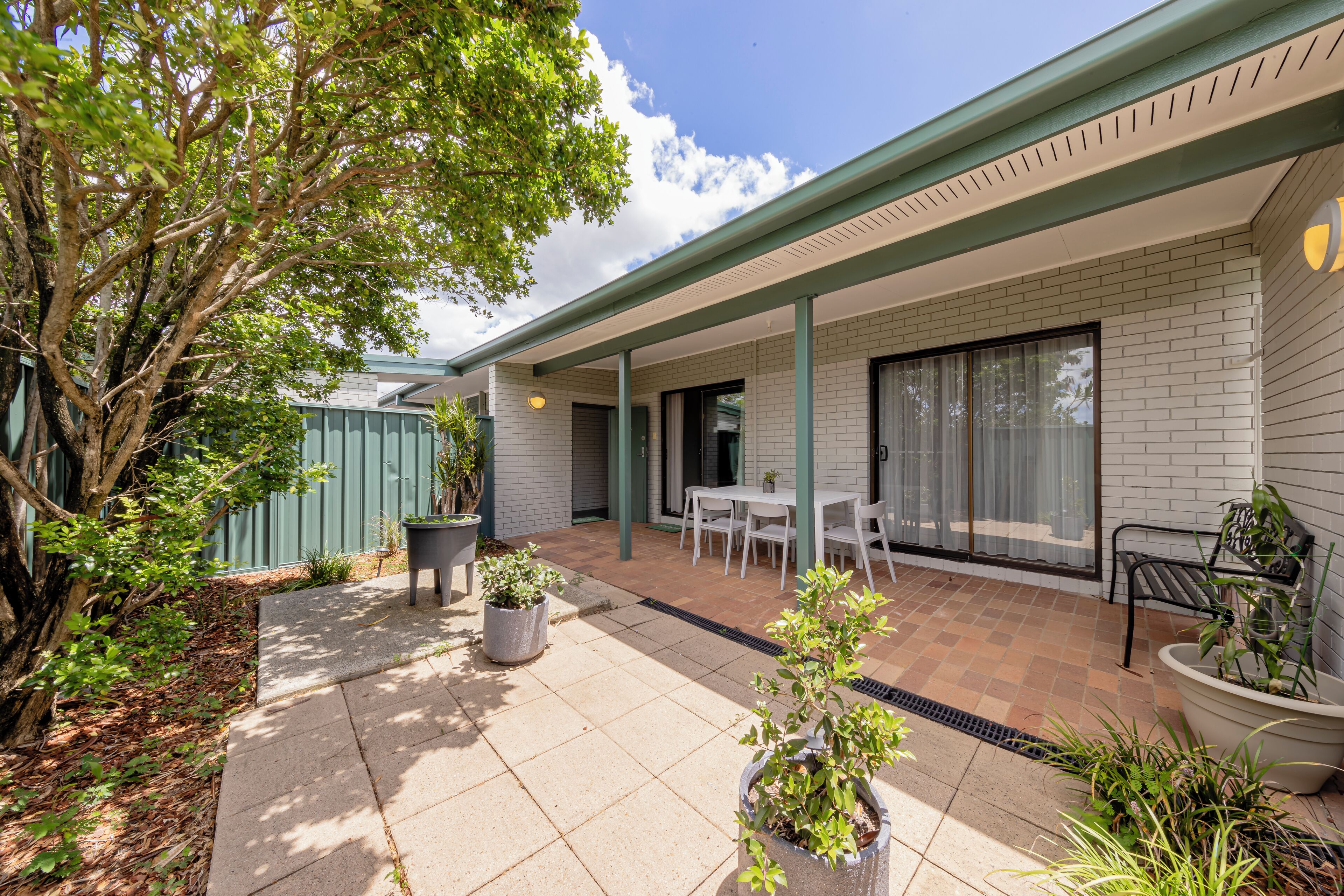 family room, multiple bedrooms | terrace/patio