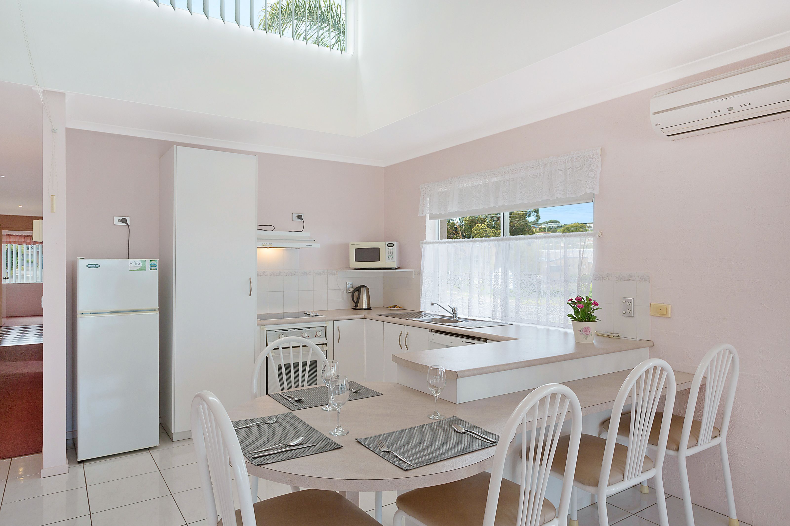 Full-sized fridge, microwave, stovetop, dishwasher