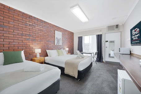 Standard Room, Non Smoking (Twin Share) | Desk, laptop workspace, soundproofing, free WiFi