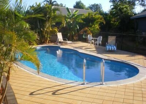 Outdoor pool, pool umbrellas, pool loungers