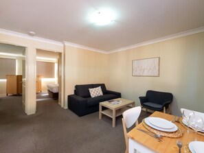 Two Bedroom Apartment - 2 Queen Beds | Living area | 43-inch TV with digital channels - Villa Nova (South Toowoomba)