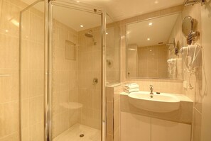 Hair dryer, towels, shampoo