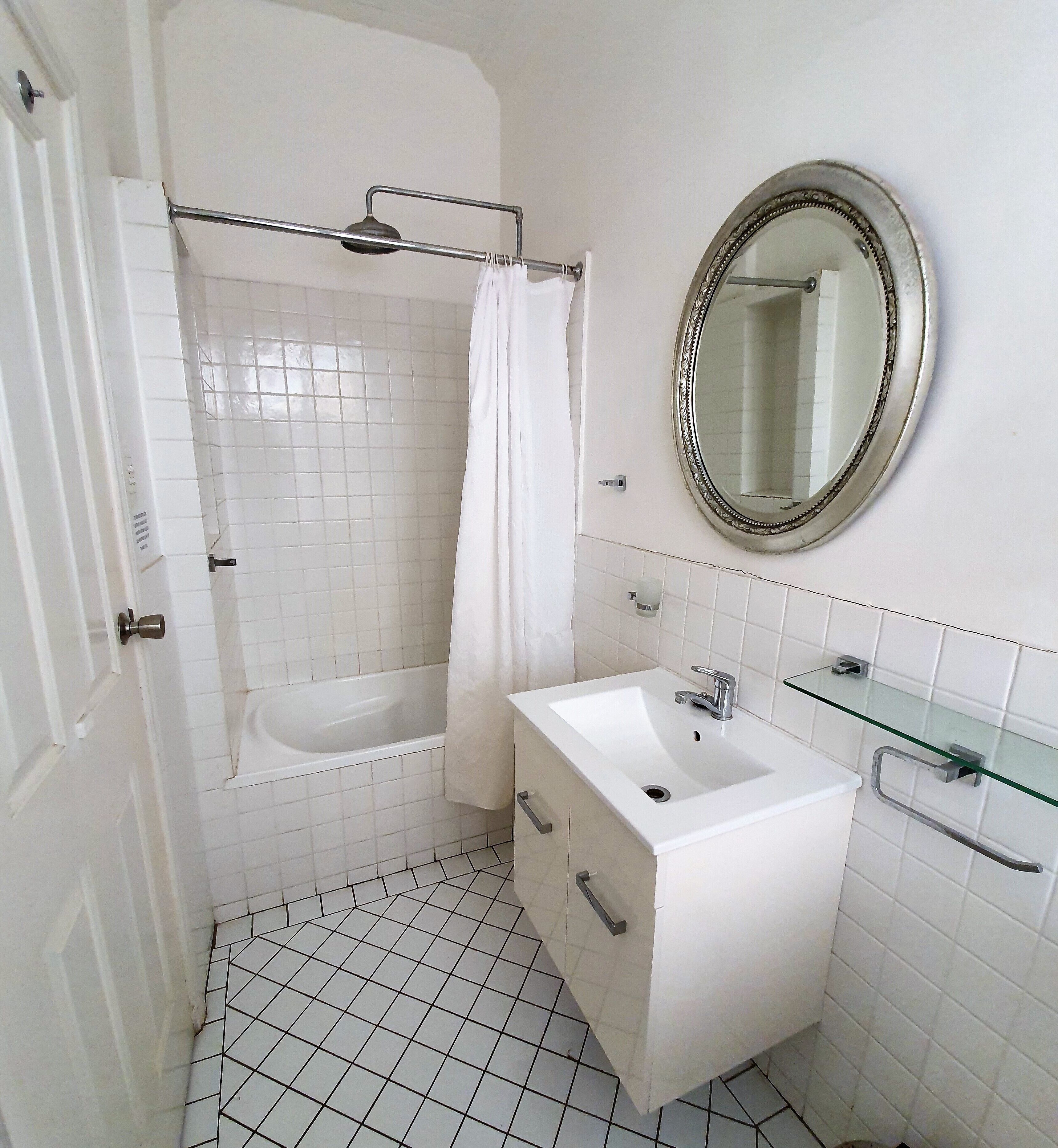 queen room 11 top floor (stair access only) | bathroom | shower, hair dryer, towels