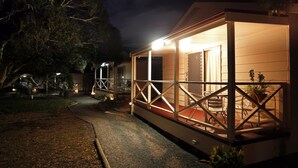 A small, single-story building with a covered porch and a dining area. - Cape Jervis Holiday Units (Cape Jervis)