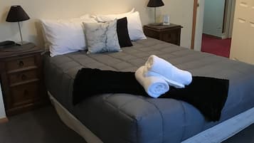 Standard Room, 1 Queen Bed, Non Smoking | 9 bedrooms, down comforters, iron/ironing board, free WiFi