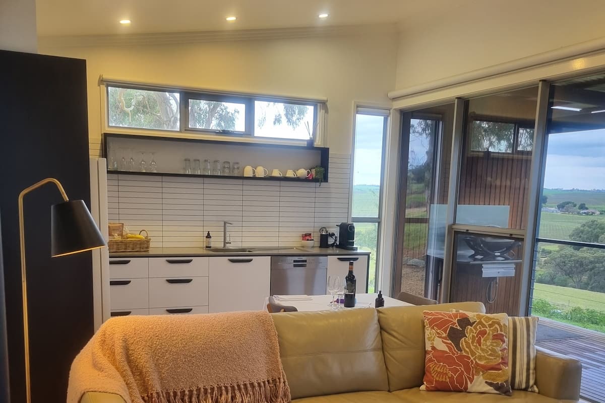 River Pavilion | Living area | 55-inch flat-screen TV with digital channels, Smart TV, fireplace
