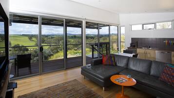 Sky Pavilion | Living room | 55-inch flat-screen TV with digital channels, Smart TV, fireplace